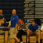 Coaches watch as their Blue Knights strive for victory